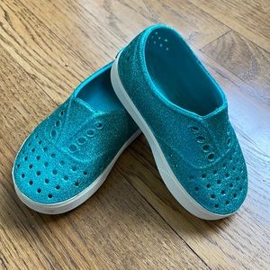 Turquoise glitter native slip-ons